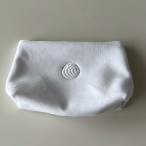 Augustin is Bader Makeup Bag